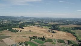 5K aerial stock footage of large fields around farms in Hillsboro, Oregon Aerial Stock Footage | AX52_112