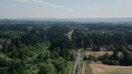 5K aerial stock footage of road through a suburban neighborhood in Hillsboro, Oregon Aerial Stock Footage | AX52_118