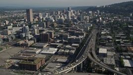 5K aerial stock footage fly along Interstate 405 and city buildings and skyscrapers, Downtown Portland, Oregon Aerial Stock Footage | AX53_024E