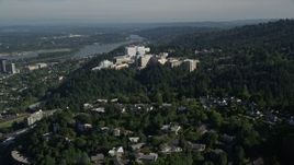 5K aerial stock footage fly away from Oregon Health and Science University with downtown in the distance, Portland, Oregon Aerial Stock Footage | AX53_028E