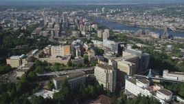 5K aerial stock footage fly away from Oregon Health and Science University with downtown in the distance, Portland, Oregon Aerial Stock Footage | AX53_030