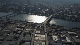 5K aerial stock footage fly over Morrison Bridge and Willamette River toward Downtown Portland, Oregon Aerial Stock Footage | AX53_048E