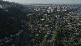5K aerial stock footage of tracking a gondola over homes and city streets, Southwest Portland, Oregon Aerial Stock Footage | AX53_064
