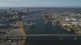 5K aerial stock footage fly over Ross Island Bridge spanning Willamette River toward Downtown Portland, Oregon Aerial Stock Footage | AX53_072