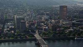 5K aerial stock footage of skyscraper and high-rises from the Willamette River, Downtown Portland, Oregon Aerial Stock Footage | AX53_075