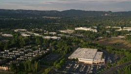 5K aerial stock footage of flying by Costco, approaching Nike Headquarters, Beaverton, Oregon, sunset Aerial Stock Footage | AX54_004