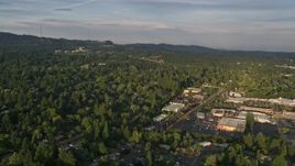 5K aerial stock footage approach and fly over suburban homes and a shopping center, Beaverton, Oregon, sunset Aerial Stock Footage | AX54_007