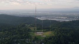 5K aerial stock footage of flying by hilltop radio towers in Southwest Portland, Oregon, sunset Aerial Stock Footage | AX54_015