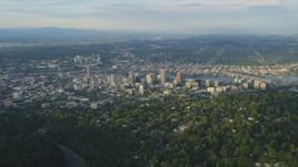 5K aerial stock footage of approaching Downtown Portland, from Southwest Portland, Oregon, sunset Aerial Stock Footage | AX54_017