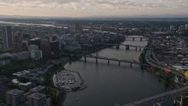 5K aerial stock footage pass by Marquam Bridge, tilt to reveal Downtown Portland, Oregon, sunset Aerial Stock Footage | AX54_032