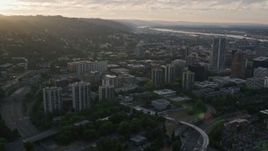 5K aerial stock footage of panning across Downtown Portland cityscape, Oregon, sunset Aerial Stock Footage | AX54_033