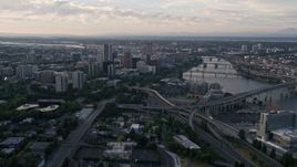 5K aerial stock footage approach and fly over KOIN Center, Wells Fargo Center, Downtown Portland, Oregon, sunset Aerial Stock Footage | AX54_037E