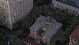 5K aerial stock footage of flying over a skyscraper, reveal Pioneer Courthouse, a federal courthouse, Downtown Portland, Oregon, sunset Aerial Stock Footage | AX54_042