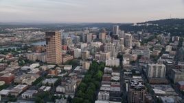 5K aerial stock footage of approaching Oregon Science and Health University from Downtown Portland, Oregon, sunset Aerial Stock Footage | AX54_048E
