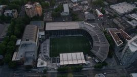 5K aerial stock footage approach Providence Park, formerly Jeld-Wen Field, Downtown Portland, Oregon, sunset Aerial Stock Footage | AX54_059