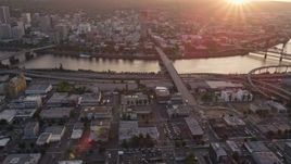 5K aerial stock footage of approaching Burnside Bridge and US Bancorp Tower, Downtown Portland, Oregon, sunset Aerial Stock Footage | AX54_070E