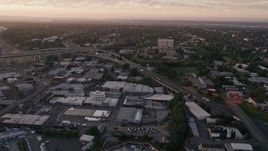5K aerial stock footage of Highway 30 / Interstate 5 interchange and warehouse buildings, North Portland, Oregon, sunset Aerial Stock Footage | AX54_073