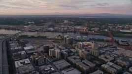 5K aerial stock footage of approaching Fremont Bridge from Downtown Portland, Oregon, sunset Aerial Stock Footage | AX54_082