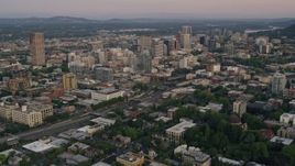 5K aerial stock footage fly over downtown, pan to KOIN Center and Wells Fargo Center, Downtown Portland, Oregon, sunset Aerial Stock Footage | AX54_086E