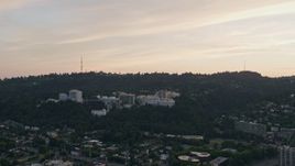 5K aerial stock footage of approaching Oregon Health and Science University, Portland, Oregon, sunset Aerial Stock Footage | AX54_089