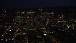 5K aerial stock footage fly over downtown to approach KOIN Center and Wells Fargo Center, Downtown Portland, Oregon, night Aerial Stock Footage | AX55_027E