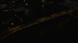 5K aerial stock footage of orbiting Marquam Bridge, Downtown Portland, Oregon, night Aerial Stock Footage | AX55_042