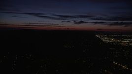 5K aerial stock footage of flying by hillside neighborhoods, Northwest Portland, Oregon, night Aerial Stock Footage | AX55_056