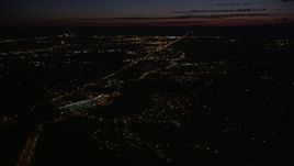 5K aerial stock footage of flying over suburbs to approach Highway 26 in Southwest Portland, Oregon, night Aerial Stock Footage | AX55_062E