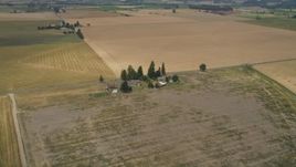 5K aerial stock footage approach a farmhouse beside a country road in Hillsboro, Oregon Aerial Stock Footage | AX56_005