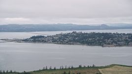 5K aerial stock footage of the town of Astoria, Oregon, beside Youngs Bay Aerial Stock Footage | AX56_068