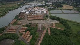 5K aerial stock footage of Skipanon River and a lumber mill in Warrenton, Oregon Aerial Stock Footage | AX56_074