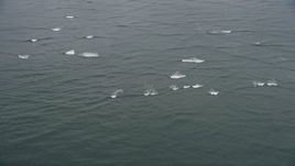 5K aerial stock footage of rolling waves on the Columbia River near Cape Disappointment, Washington Aerial Stock Footage | AX56_084