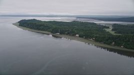 5K aerial stock footage fly over green shore and evergreen forest on Long Island, Washington Aerial Stock Footage | AX56_148E