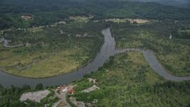 5K aerial stock footage pan across the Willapa River in Raymond, Washington Aerial Stock Footage | AX56_176