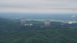 5K aerial stock footage of Satsop Nuclear Power Plant, farmland in the background, Washington Aerial Stock Footage | AX57_010