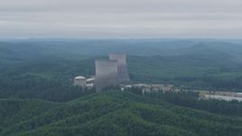 5K aerial stock footage of two cooling towers at the Satsop Nuclear Power Plant, Satsop, Washington Aerial Stock Footage | AX57_013