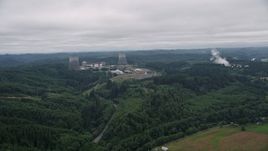 5K aerial stock footage of Satsop Nuclear Power Plant surrounded by forest in Satsop, Washington Aerial Stock Footage | AX57_015