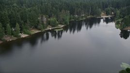 5K aerial  video of lakeside homes by Stansberry Lake in Gig Harbor, Washington Aerial Stock Footage | AX58_036