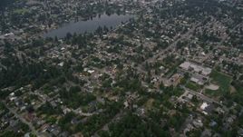 5K aerial stock footage fly over and tilt to suburban homes near Lake Burien in Burien, Washington Aerial Stock Footage | AX58_070