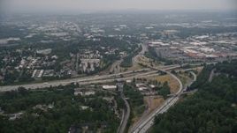 5K aerial stock footage fly by office buildings and the I-405 / I-5 interchange, Tukwila, Washington Aerial Stock Footage | AX58_075E