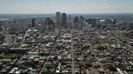 5K aerial stock footage follow Bourbon Street through French Quarter to approach Downtown New Orleans, Louisiana Aerial Stock Footage | AX59_006