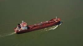 5K aerial stock footage of an oil tanker sailing on Mississippi River, New Orleans, Louisiana Aerial Stock Footage | AX59_010