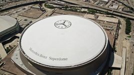 5K aerial stock footage approach the Mercedes-Benz Superdome, Downtown New Orleans, Louisiana Aerial Stock Footage | AX59_019