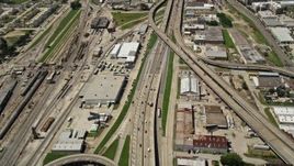 5K aerial stock footage of light traffic on the I-10 / Highway 90 interchange in Mid-City New Orleans, Louisiana Aerial Stock Footage | AX59_020