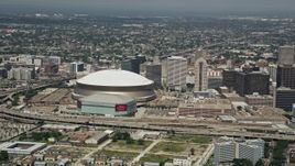 5K aerial  video of Mercedes-Benz Superdome and New Orleans Arena, New Orleans, Louisiana Aerial Stock Footage | AX59_028