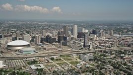 5K aerial stock footage of Downtown New Orleans skyscrapers and Mercedes-Benz Superdome, Louisiana Aerial Stock Footage | AX59_029