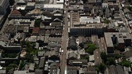 5K aerial stock footage tilt to a bird's eye view of Bourbon Street in the French Quarter, New Orleans, Louisiana Aerial Stock Footage | AX59_035E