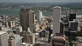 5K aerial stock footage fly between Place St. Charles and One Shell Square in New Orleans, Louisiana, pan to reveal French Quarter Aerial Stock Footage | AX59_042
