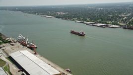 5K aerial stock footage of an oil tanker sailing on Mississippi River, New Orleans, Louisiana Aerial Stock Footage | AX59_055