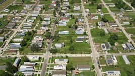 5K aerial stock footage fly over rows of homes in Lower Ninth Ward, New Orleans, Louisiana Aerial Stock Footage | AX59_057E